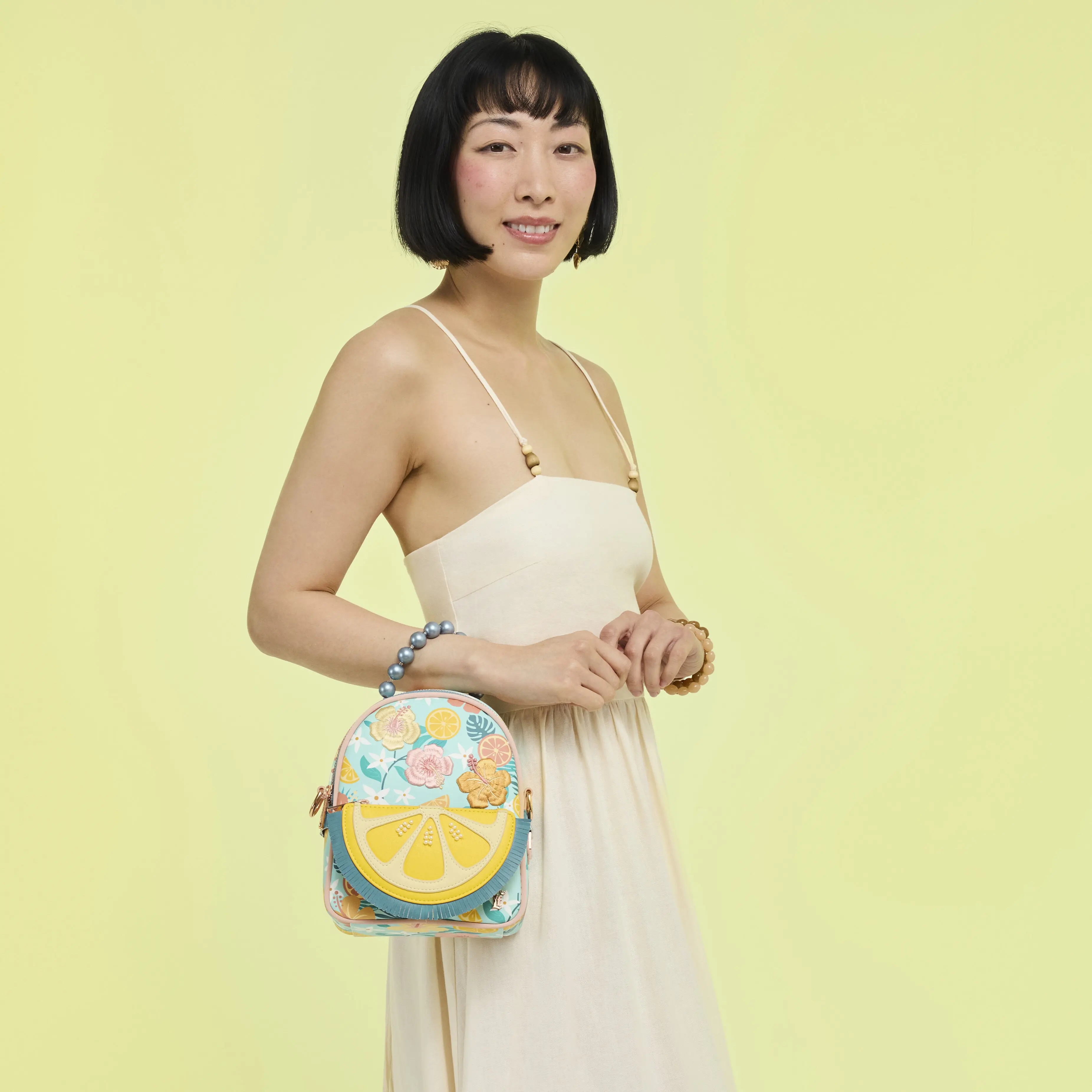 Loungefly Tropical Lemon Floral Convertible Mini Backpack & Crossbody Bag - Image 2